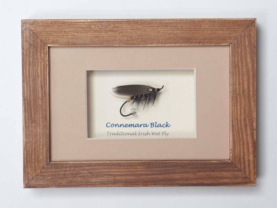 Wooden frame with Connemara Black Wet Fly